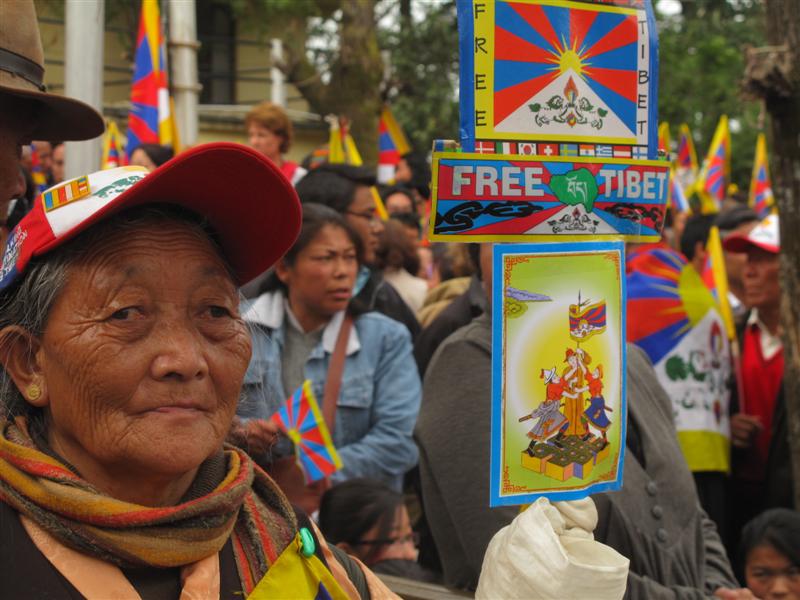 Old Tibetan woman protests