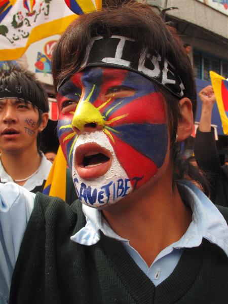 Tibetan flag painted on Face