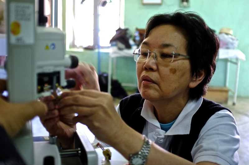 Siew Kim Teo assembling donated equipment at Hakha Eye Centre