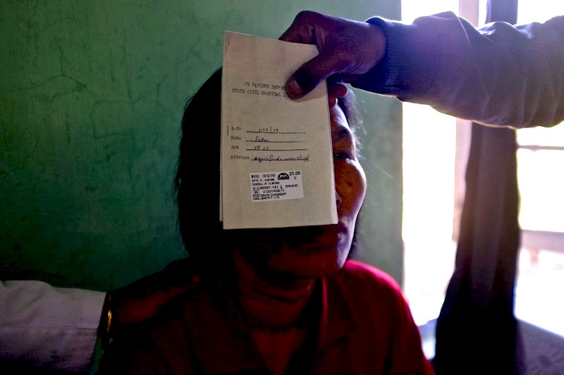 Assessing the vision of a patient following cataract surgery at Hakha Eye Centre