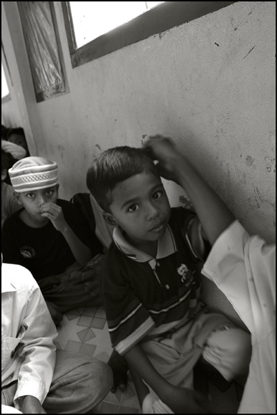 A boy in the morning class at an orphanage in Banda Aceh Indonesia