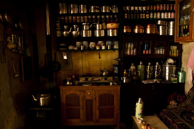 Traditional Tibetan utensils and glimpse of a kitchen of a local Loba family in Upper Mustang (Custom)