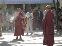 The Dalai Lama comes out of his residence in Dharamsala, India