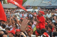 crowds celebrate in the streets of Rangoon