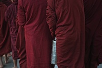 monks collecting alms