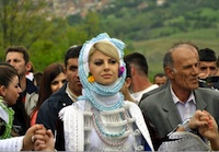 Young Gorani girl in traditional costumes.