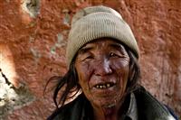 A portrait of an local Loba man in Upper Mustang