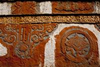 A wall of the monastery that showcases Buddhist textures, showcasing Upper Mustang's richness.